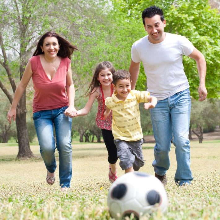 A family playing soccer